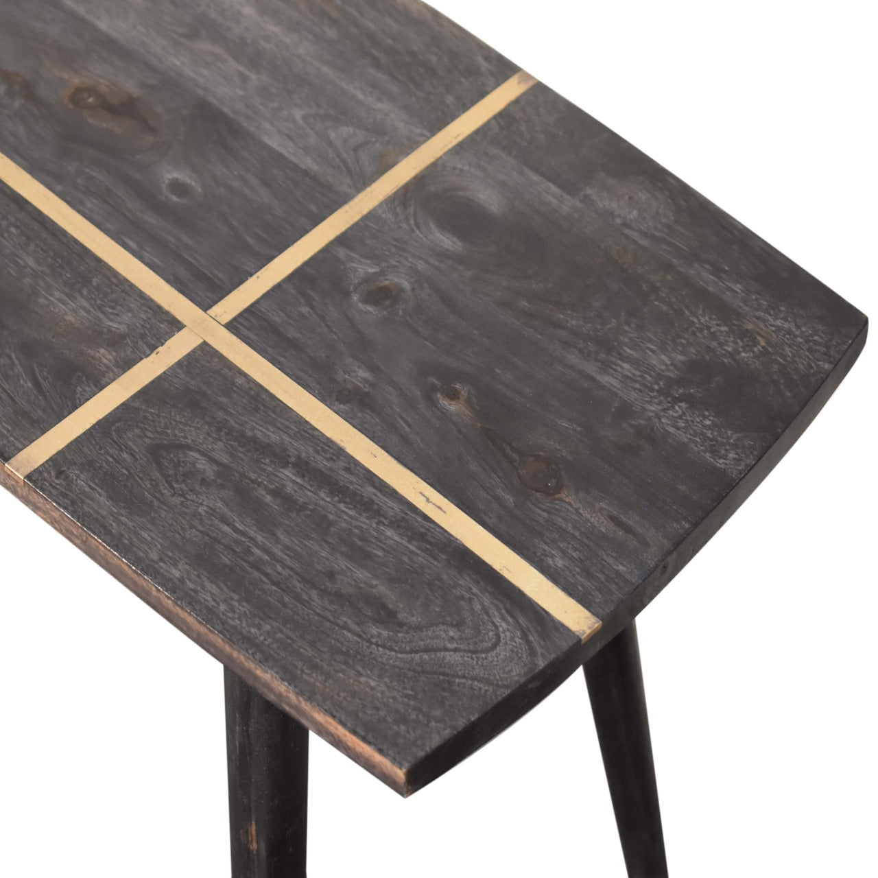 Table basse en frêne noir incrustée de laiton